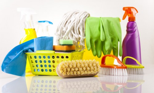 Staff member wearing PPE while carrying out carpet cleaning